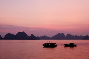 Boats on the sea at the sunset in the Halong Bay
