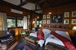 View of the beds in a bungalow La Folie Lodge